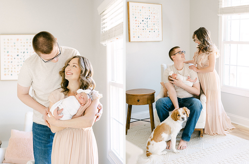 New parents, Emily and Zach, holding their newborn daughter in her nursery.