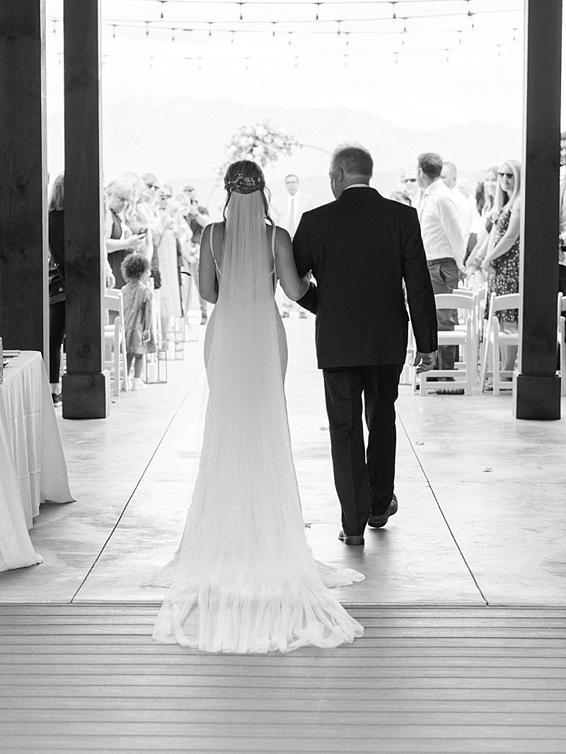 Father walking his daughter down the aisle at The Trillium Venue. 